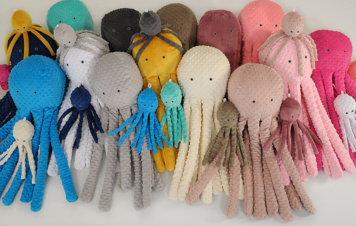 Cuddly octopus with rattle - bottle green - polka dot minky