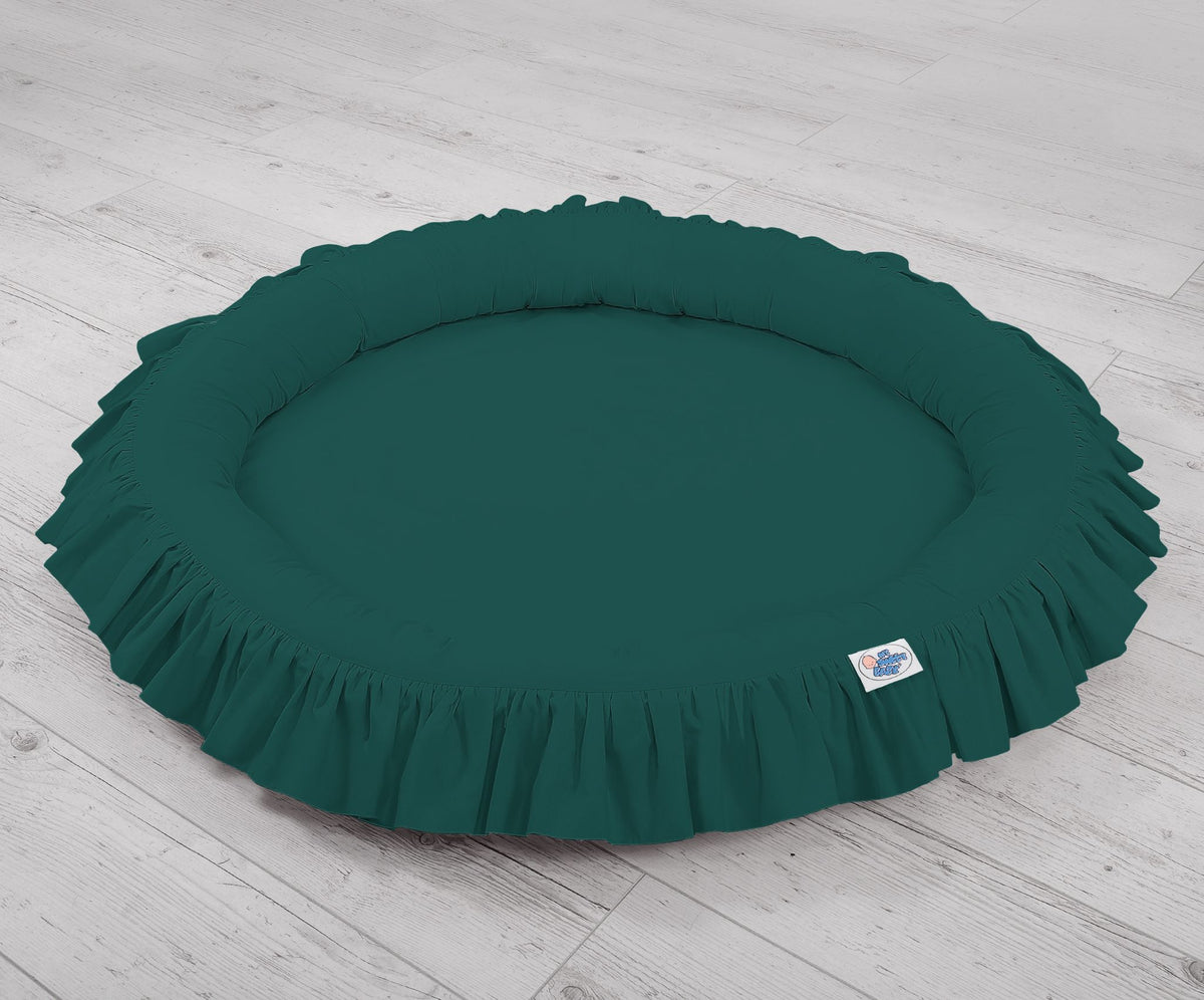 Nest with flounce - bottle green