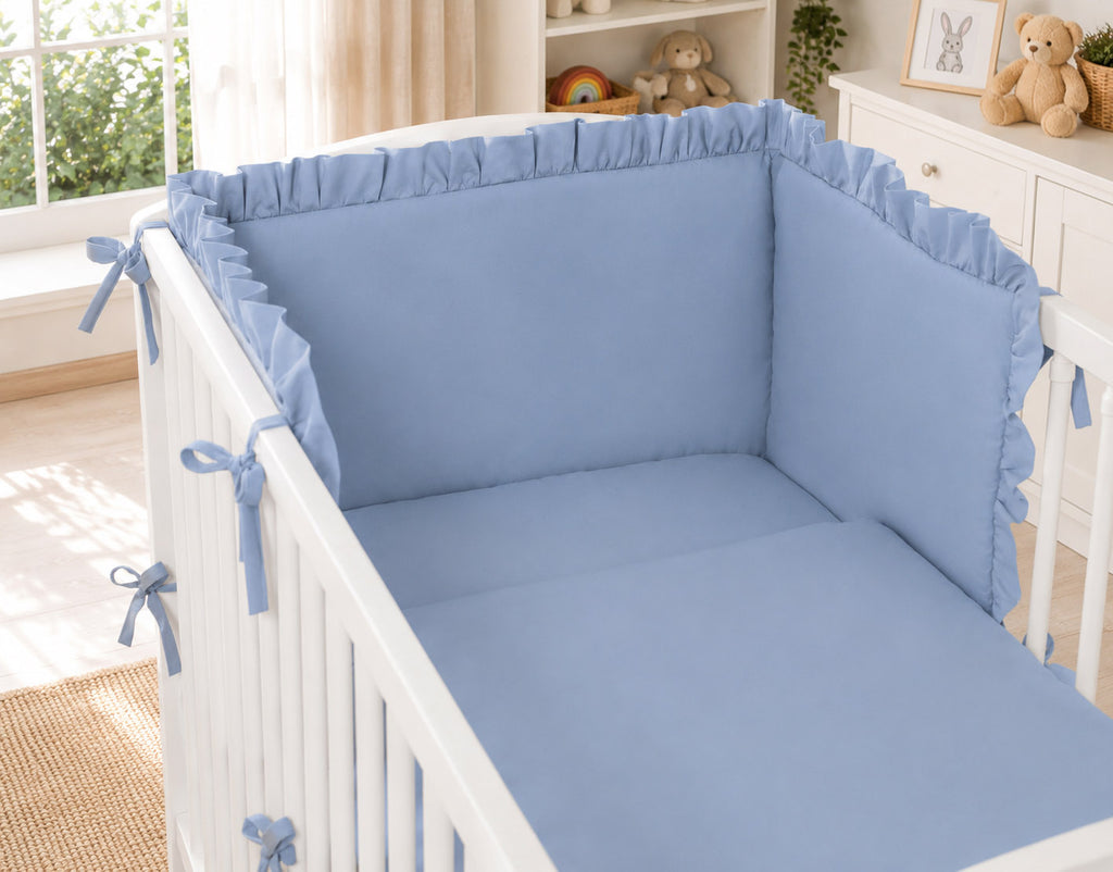 Universal baby bed bumper with frill - pastel blue